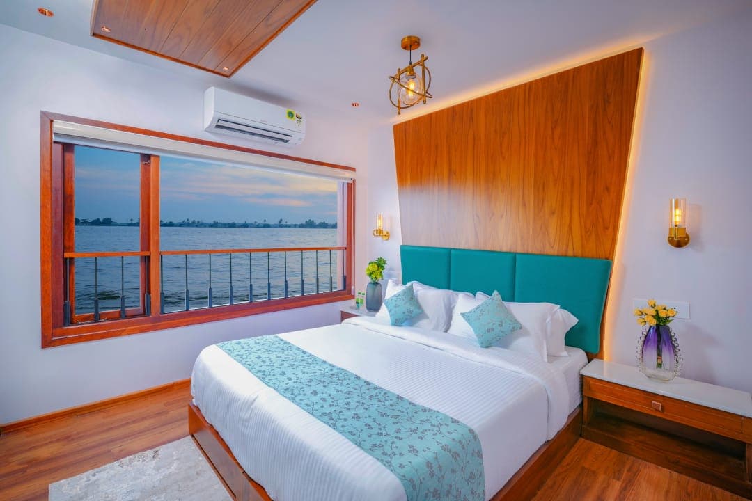 Shared open deck with canal views on a Kerala houseboat